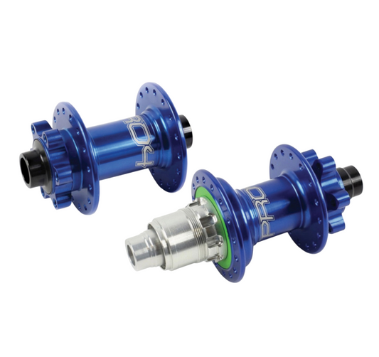 Two blue anodized Hope Pro 4 bicycle hub components on a plain white background, with one showing the rear flange and the other showing the front splined end.
